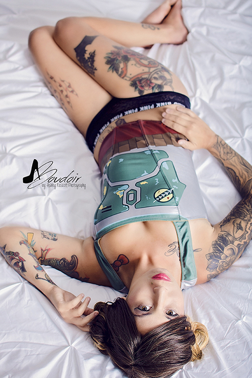 princess leia buns with boba fett corset laying on bed, star wars boudoir