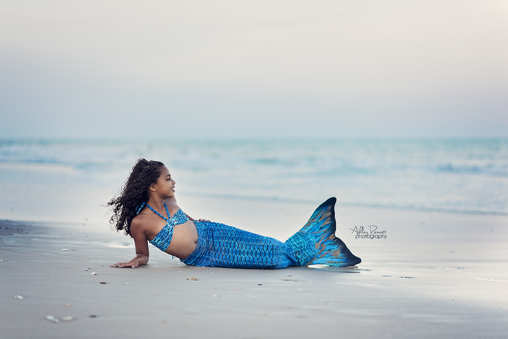 young mermaid on beach