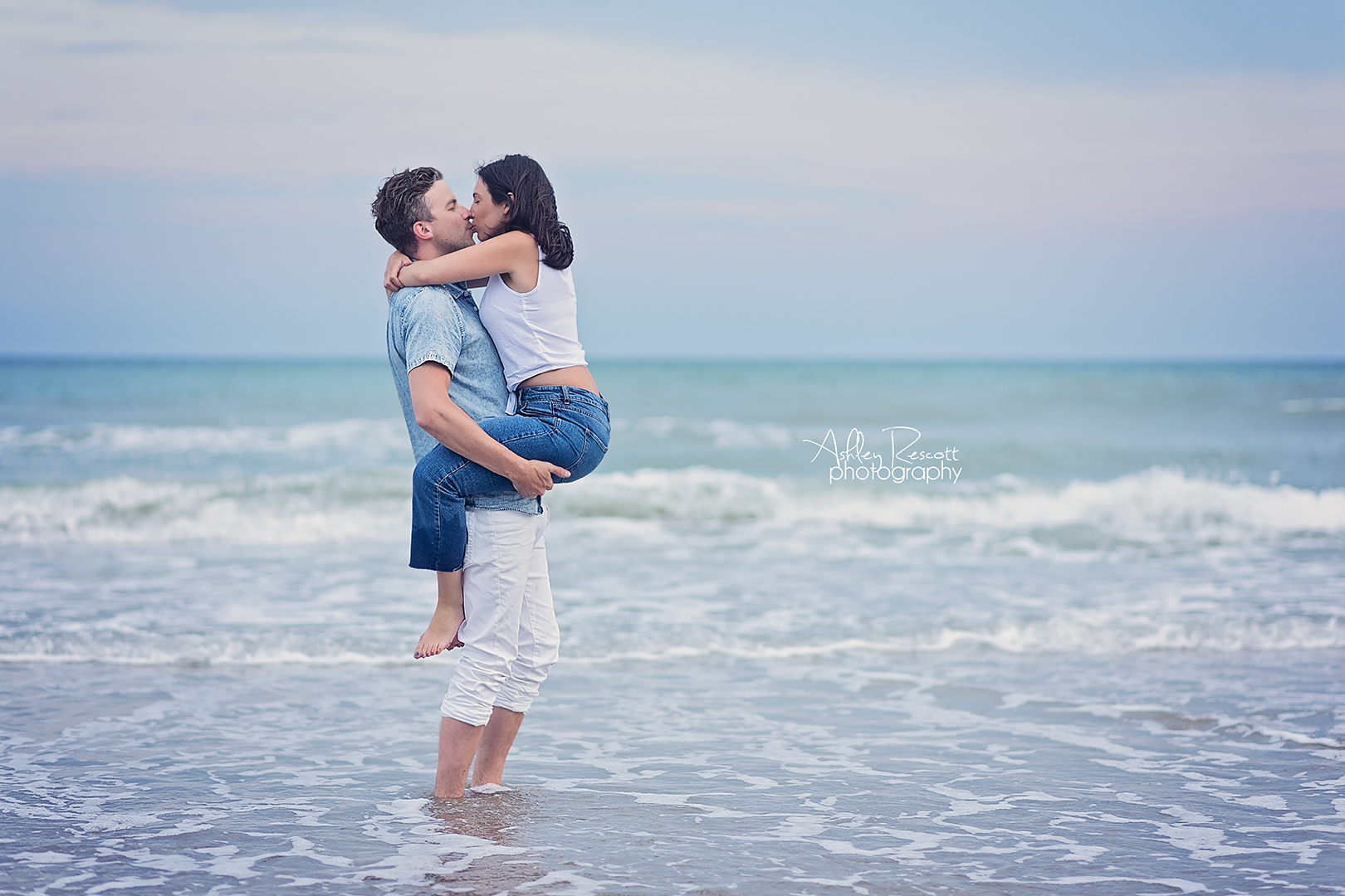 kissing couple at beach