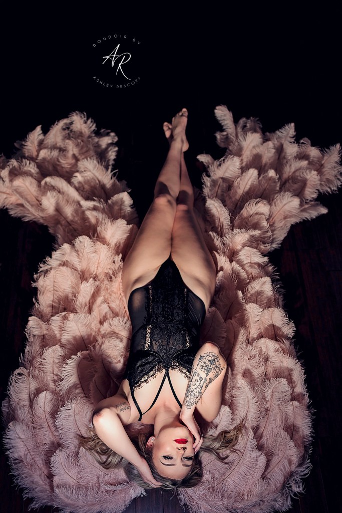 Portfolio image of dramatic light boudoir with wings