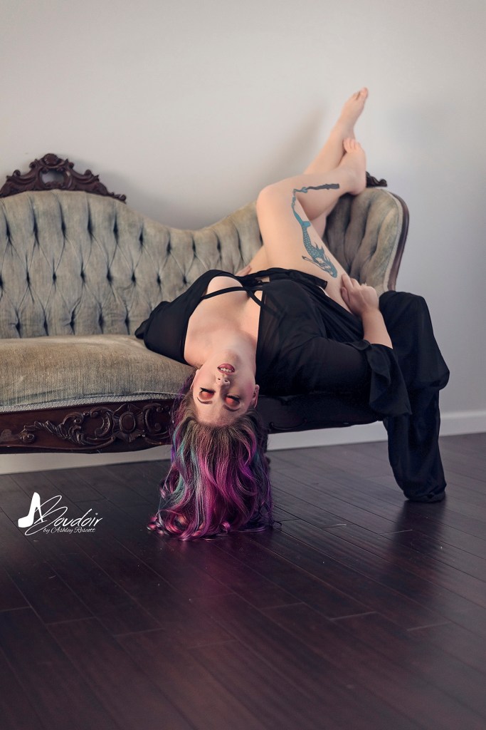 mermaid hair model upside down on couch